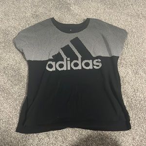 This is a black adidas shirt